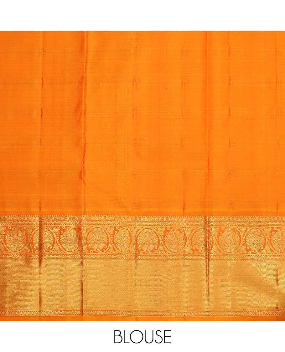 Orange pure-silk half-saree, zari buttas and checked skirt, contrast kodi visiry border, zari design blouse, and a intricate zari woven dhavani