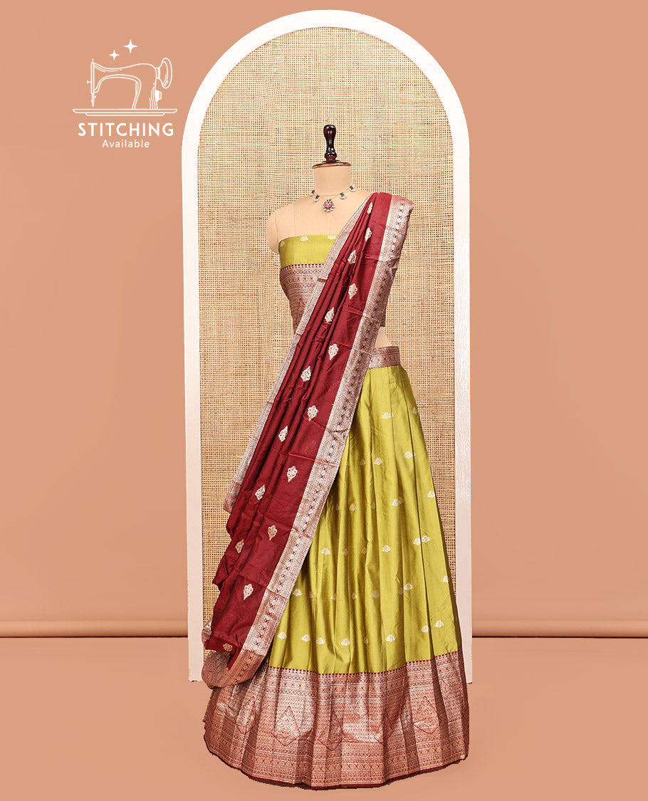 Green Art Silk Half Saree, Adorned with Buttas Skirt, Contrast Traditional Border, Matching Blouse, and a Contrast Banaras Dhavani