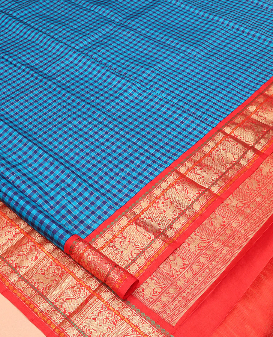 Blue Vasundhara Silk Saree, Woven with Checks, a Contrast Border of Poun, Yaanai, Neli, Mayil, and Yaali Designs, Neli Striped Pallu, and a Contrast Blouse