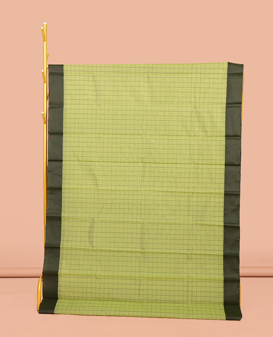 Green Semi-Silk Cotton Saree, Subtly Sparkled with Checks All Over Its Body, Complemented by a Contrast Border, Striped Pallu, and Paired with a Matching Blouse
