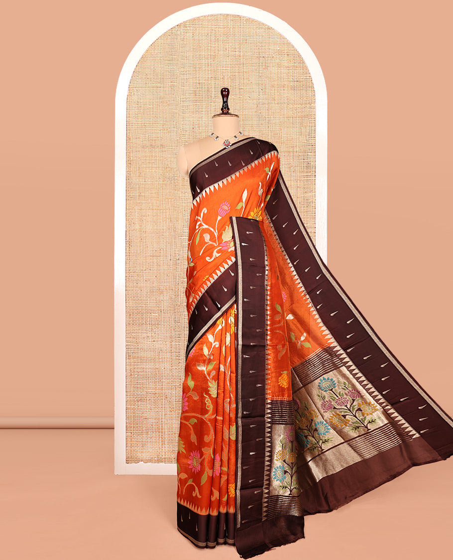 Orange Matka Silk Saree, Spotlighted with Meenakari Floral Vine All Over Its Body, Complemented by a Contrast Border of Traditional and Muniya Designs, Pallu of Floral Designs, and Paired with Contrast Blouse