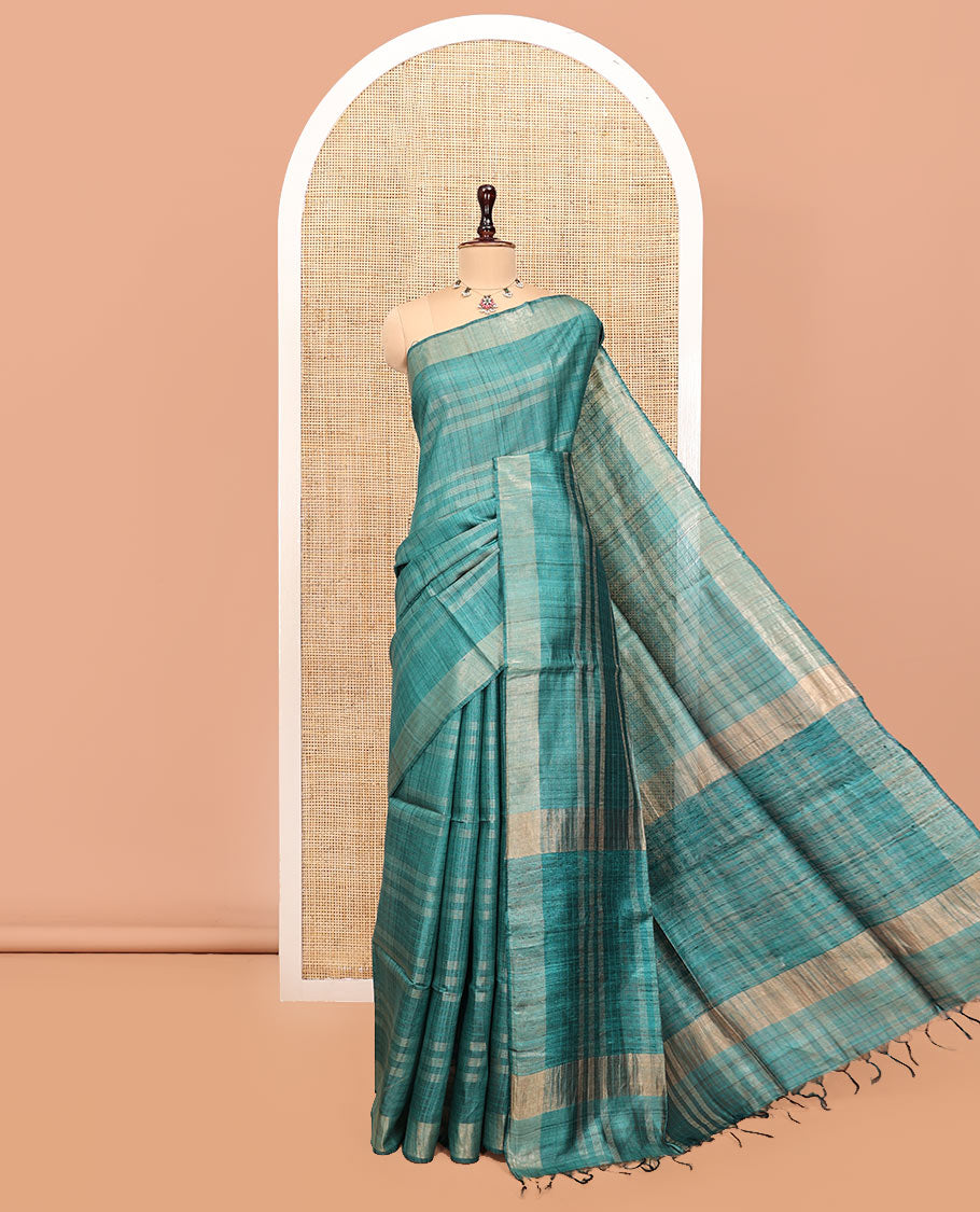 Green Tussar Silk Saree, Sparsely Threaded with Stripes, a Subtle Border, a Self-Pallu, and a Matching Blouse