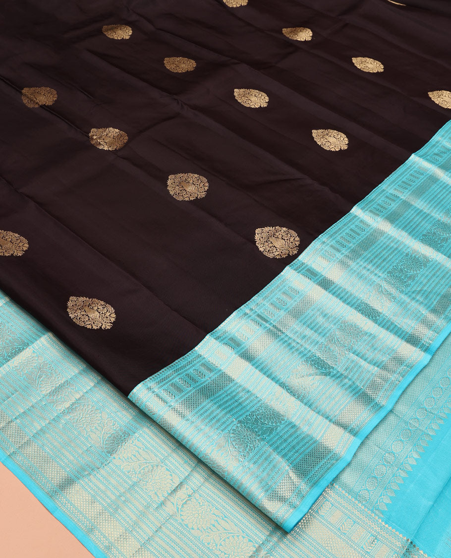 Brown Vasundhara Silk Saree, Spotlighted with Zari Buttas All Over Its Body, Complemented by a Contrast Border of Kodi Visiry Designs, a Grand Pallu, and Paired with a Contrast Blouse