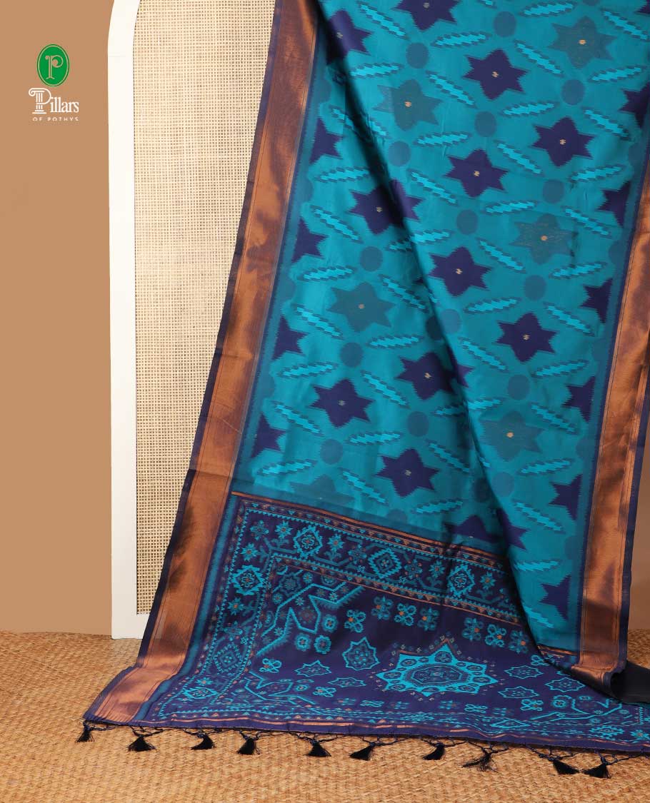 Peacock blue pochmmpally ikkat design mulberry silk saree with zari katti border & zari ikkat desig pallu along with contrast blouse