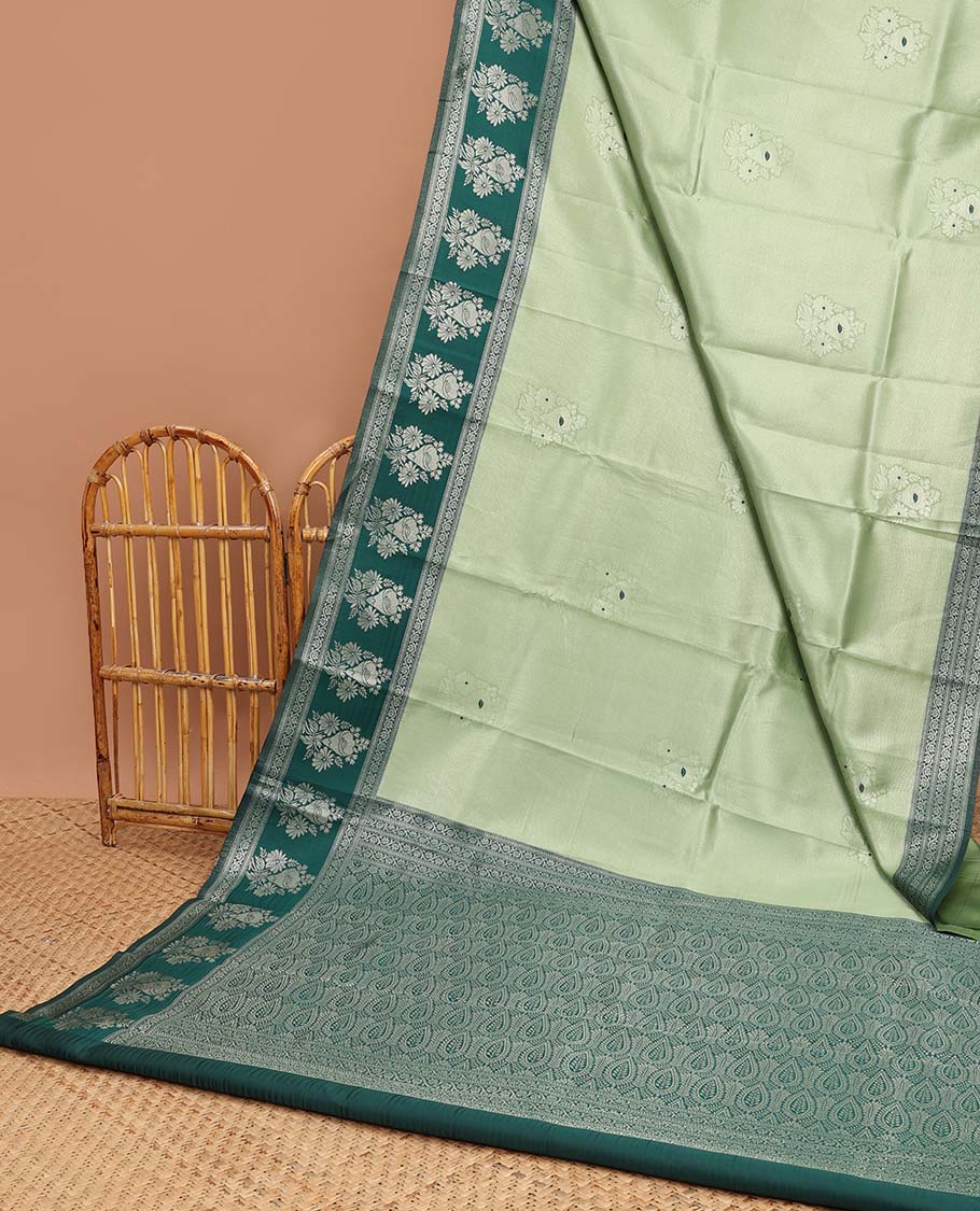 Mint green floral motifs litchi silk saree with contrast floral design border & floral jaal design pallu