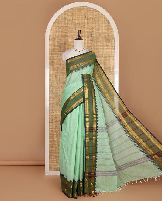 Green plain Chettinad cotton saree, contrast  traditional zari rettai pettu temple border, striped pallu and plain blouse