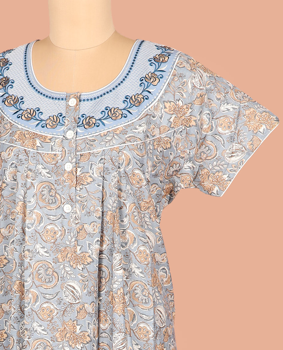Grey Cotton Nighty Prettified with Floral-Leaf Patterns Print, Featuring Patch Embroidered Neck, Round Front Neck, and Half-Sleeves