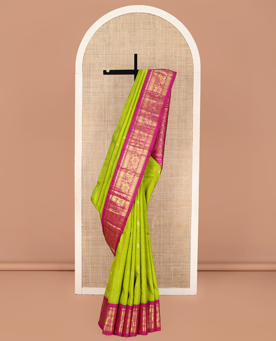 Green Kanchipuram Silk Saree, Sparsely Woven with Zari Buttas on Its Body, Complemented by a Contrast One-Sided Korvai Border of Manga Mokku, Banaras, Diamond and Kodi Visiry Designs, Pallu of Floral Jaal Designs, and Comes Without a Blouse