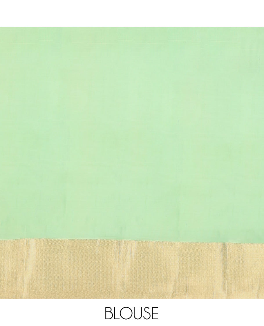 Green Vasundhara Silk Saree, Steeped with Zari Buttas on Its Body, Highlighted by a Zari Border of Traditional Designs, Richly Woven Jaal Pallu, and Paired with a Matching Blouse