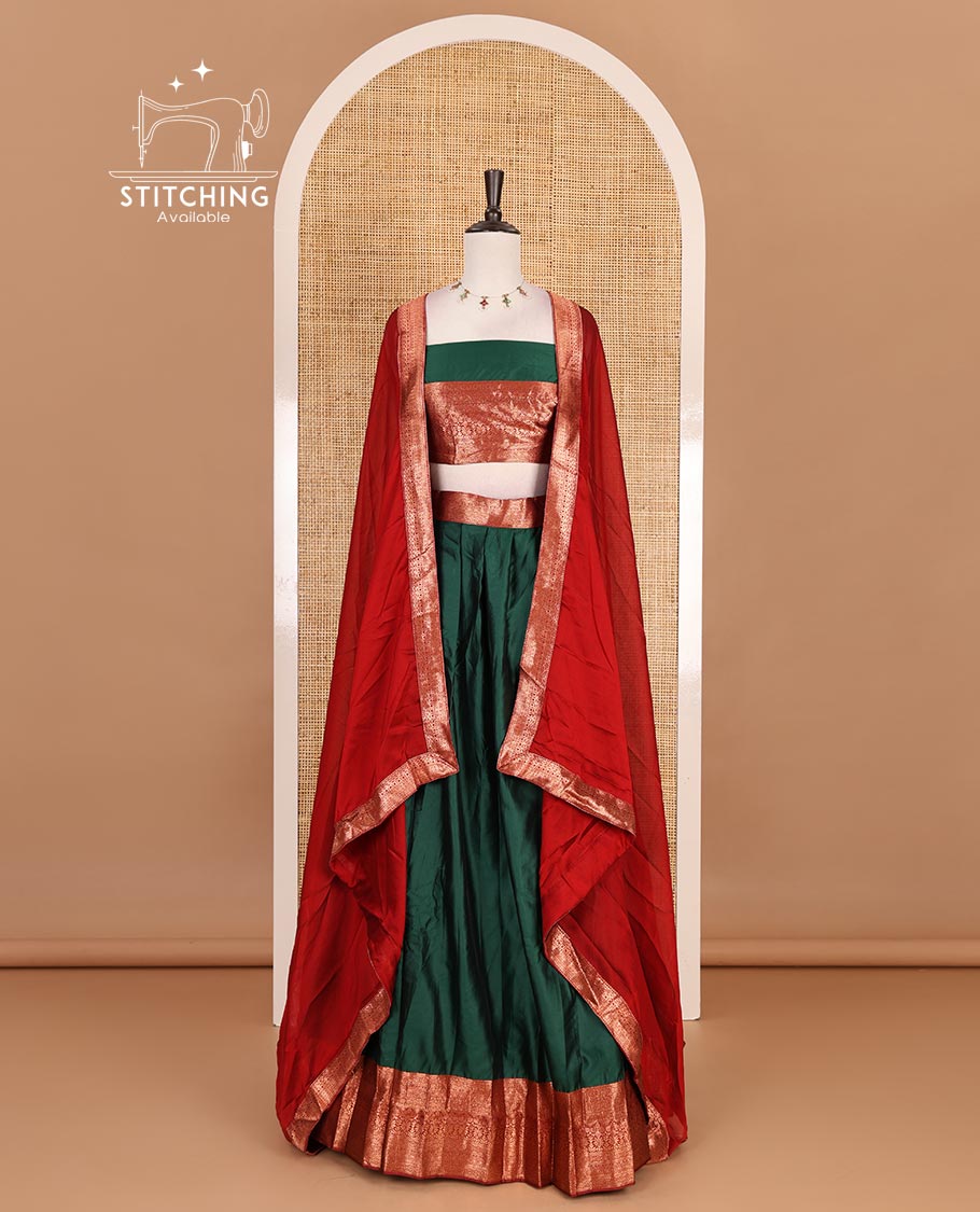Dark green taffeta silk half saree, plain with contrast red traditional zari border, matching zari blouse, and contrast plain zari border dhavani