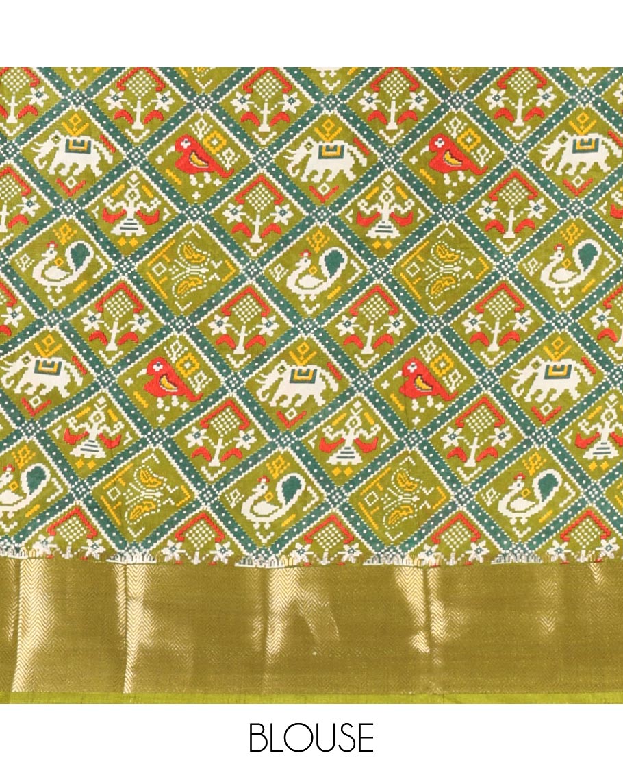 Green plain dola-tussar saree, contrast temple zari border, patola animal motifs enclosed jaal printed pallu & patola printed blouse