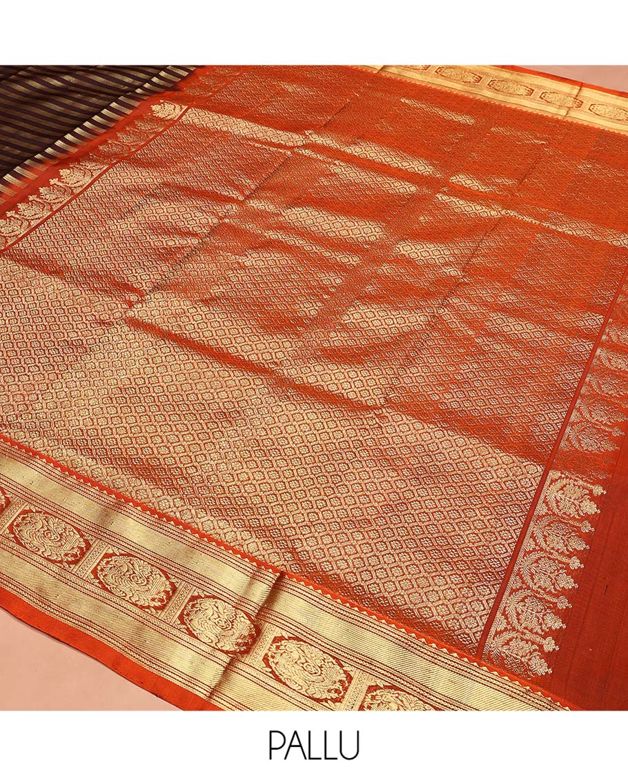 Brown Venkatagiri Silk Saree, Bedecked with Zari Stripes All Over Its Body, Complemented by a Contrast Traditional Zari Border of Round Peacock Designs, Jaal Design Pallu, and Paired with a Contrast Blouse
