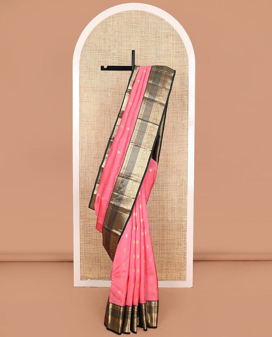 Pink zari buttas Vasundhara silk mix saree, contrast border of manga, muthu, kamalam, diamond, and mayil designs, and pallu of leaf vine