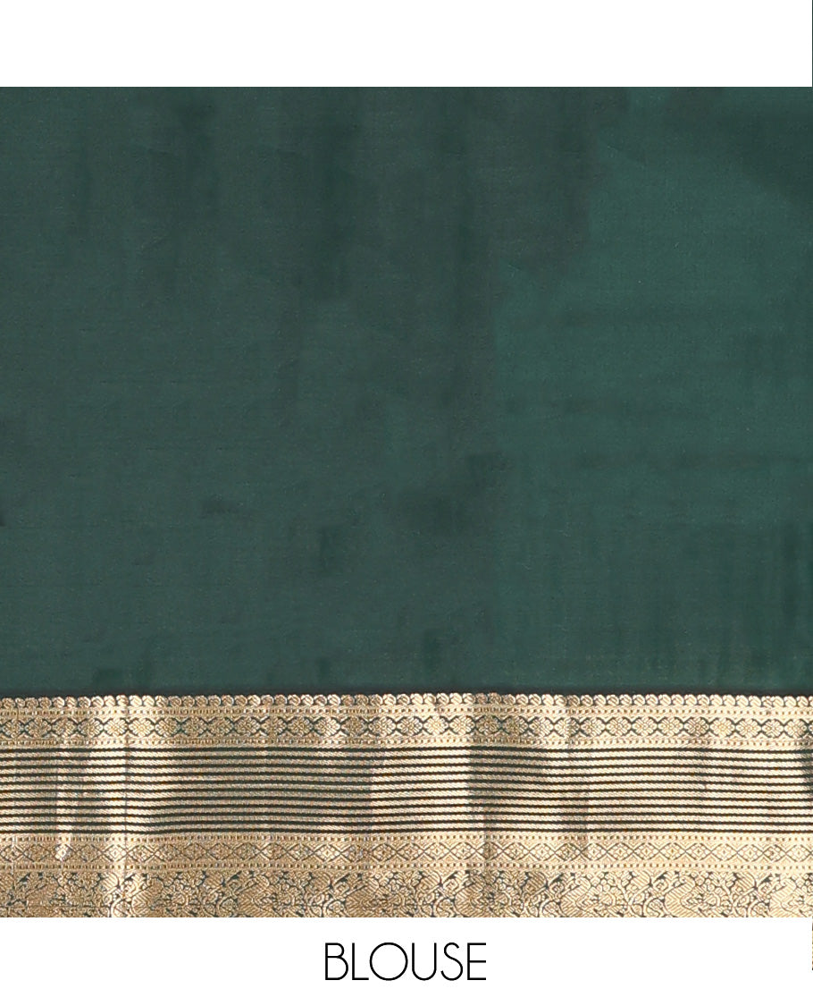 Pink zari buttas Vasundhara silk mix saree, contrast border of manga, muthu, kamalam, diamond, and mayil designs, and pallu of leaf vine