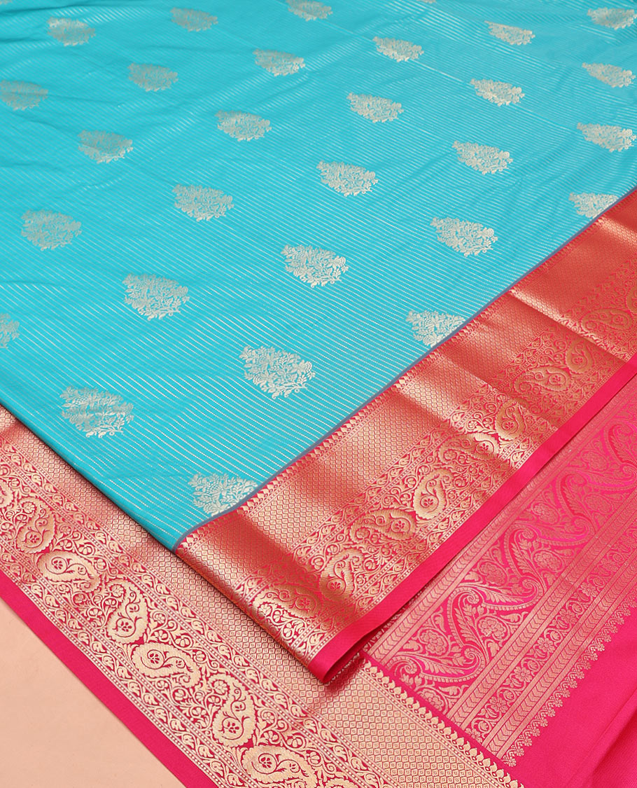 Peacock Green and Rani Pink Budget Silk Saree, Embellished with Vaira Oosi Stripes and Zari Buttas All Over Its Body, Complemented by Contrast Traditional Zari Designs Woven Border of Paisleys, Grand Pallu and Paired with a Contrast Blouse