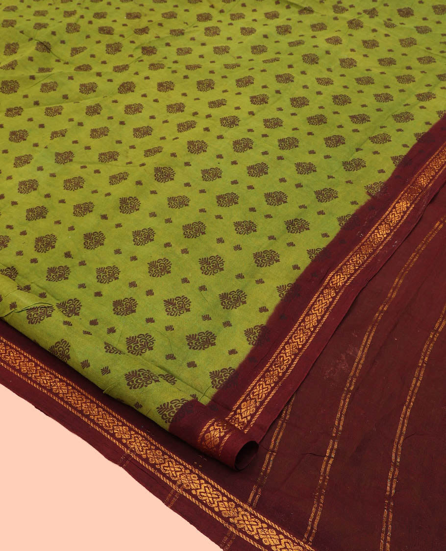 Green Nine Yard Cotton Saree, Adorned with Buttas All Over Its Body, Complemented by Contrast Zari Border, Striped Pallu, and Comes Without a Blouse