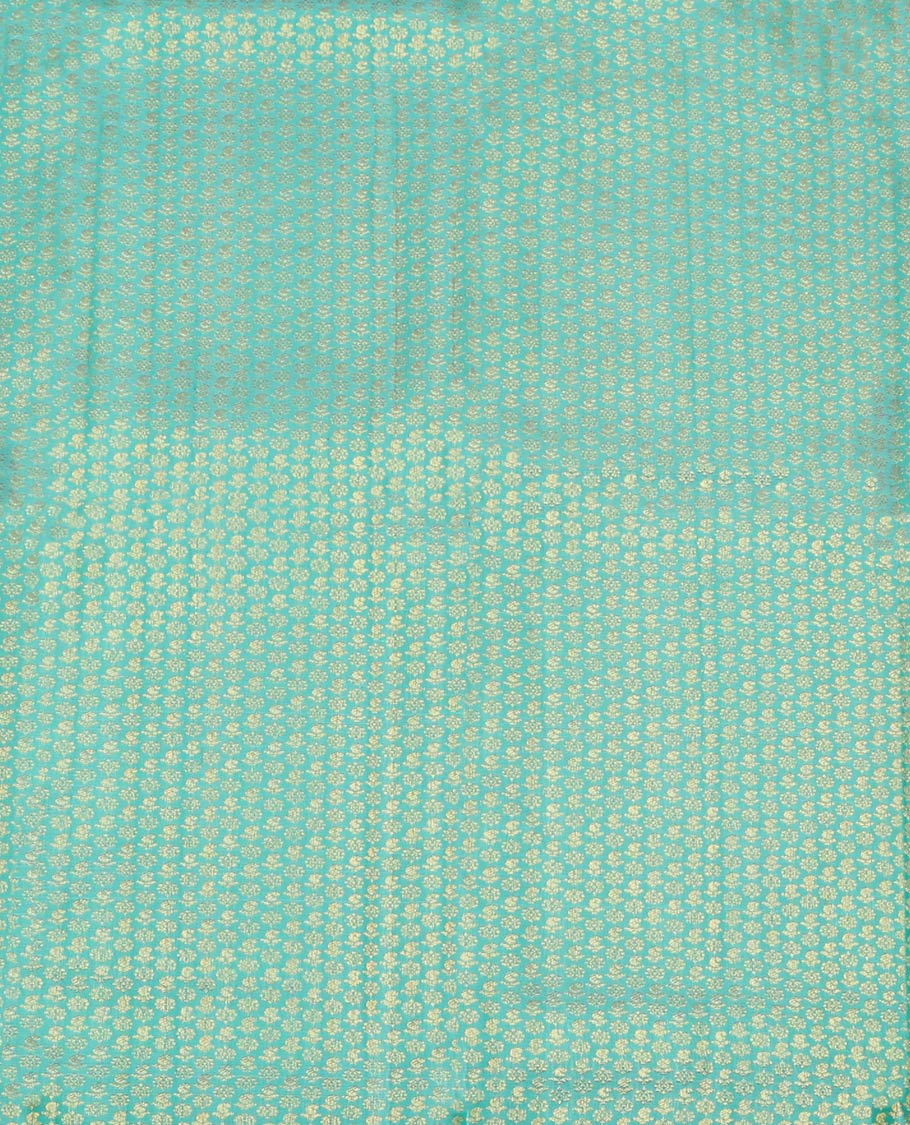 Blue Pure Silk Half-Saree, Gleamed Up with Zari Buttas on Its Skirt, Complemented by a Contrast Border Featuring Kodi Visiry, Neli, Muthu, and Jaal Designs, Comes with a Contrast Blouse and a Dhavani of Jaal Designs