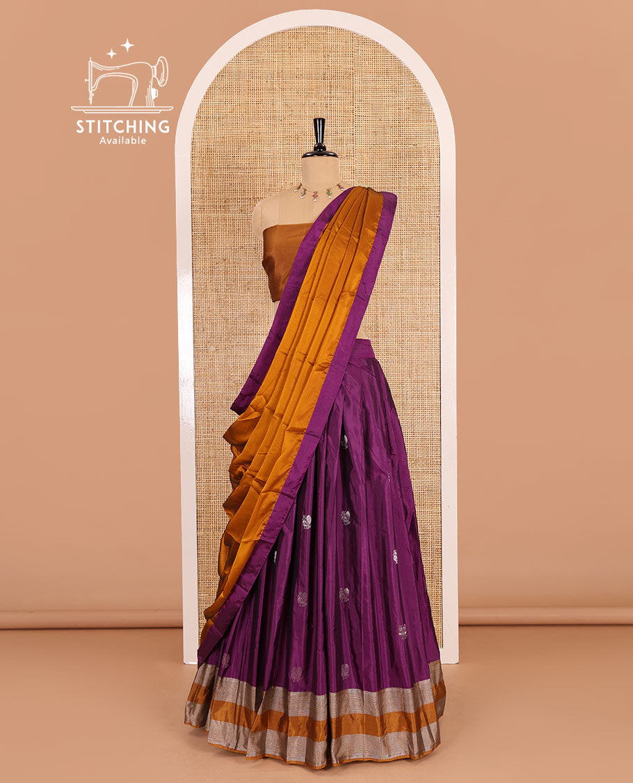 Purple and mustard half-saree, peacock butta with contrast bordered taffeta silk skirt, a plain blouse, and a contrast bordered syska georgette dhavani