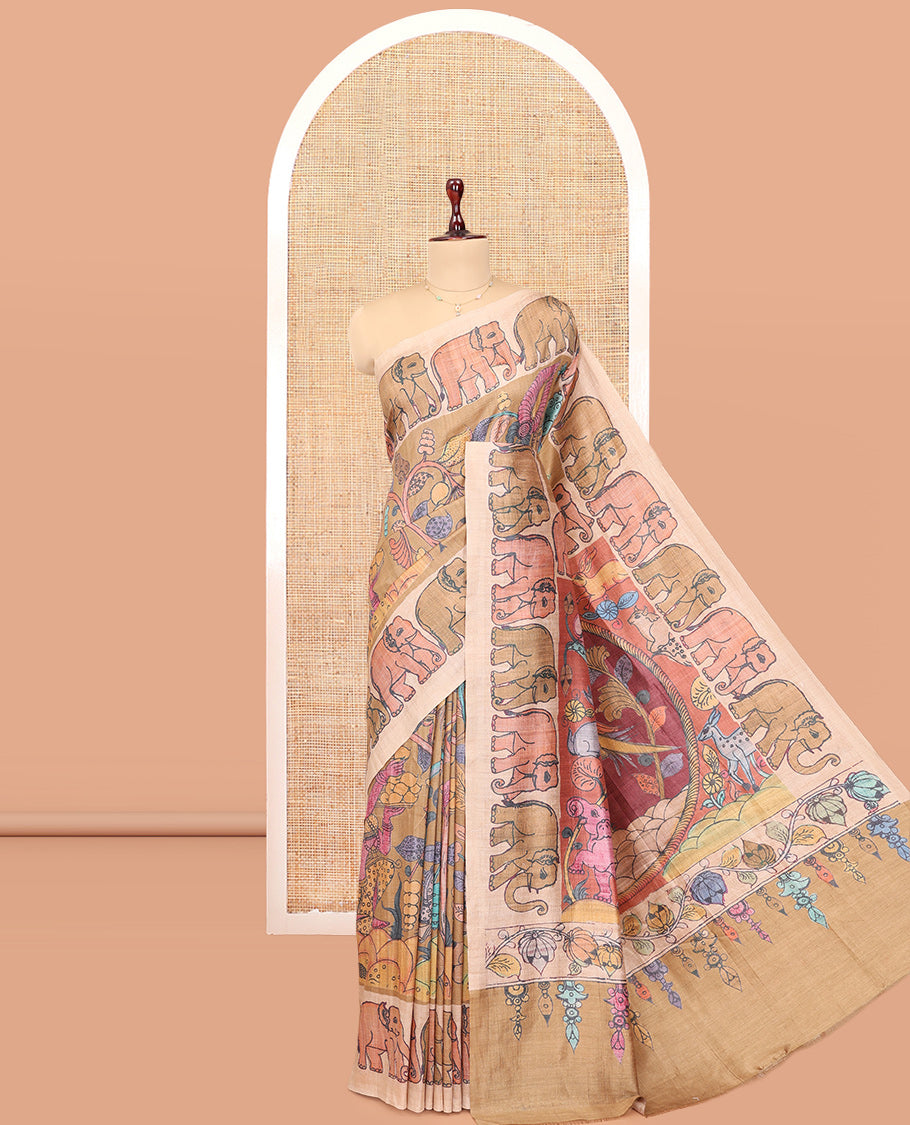 Brown Fancy Tussar Saree Features Kalamkari Floral and Animal Print, Contrast Elephant Border, Kalamkari Pallu, and a Contrast Blouse