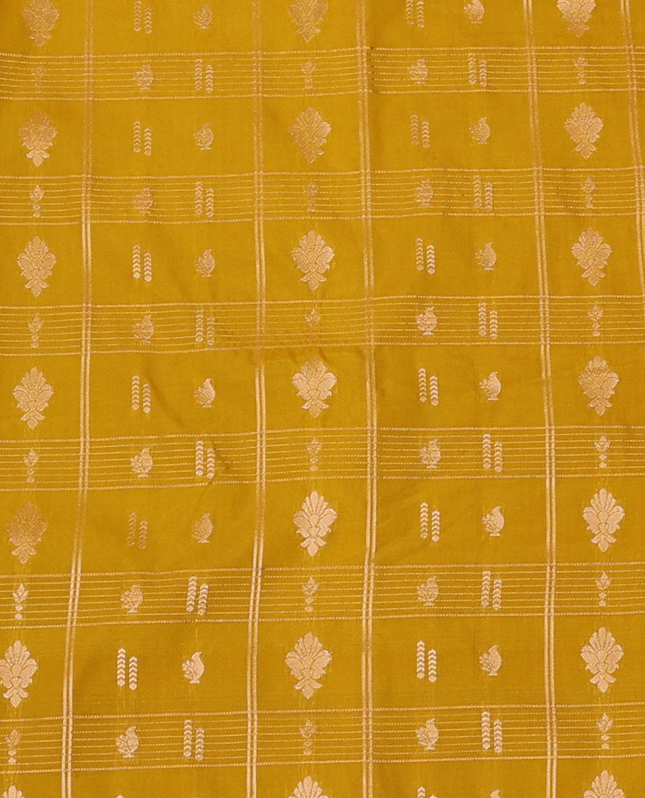 Yellow Art Silk Pavadai Material Set Featuring a Zari Butta Enclosed Checked Skirt, Complemented by a Contrast Traditional Zari Motifs Woven Border, and Paired with a Contrast Blouse