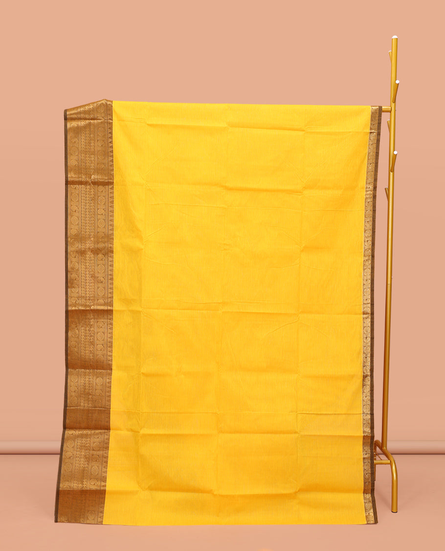 Yellow Plain Chettinad Cotton Saree, Complemented by a Contrast Traditional Zari Design Woven Temple Border, Sparsely Striped Pallu, and Paired with a Matching Blouse