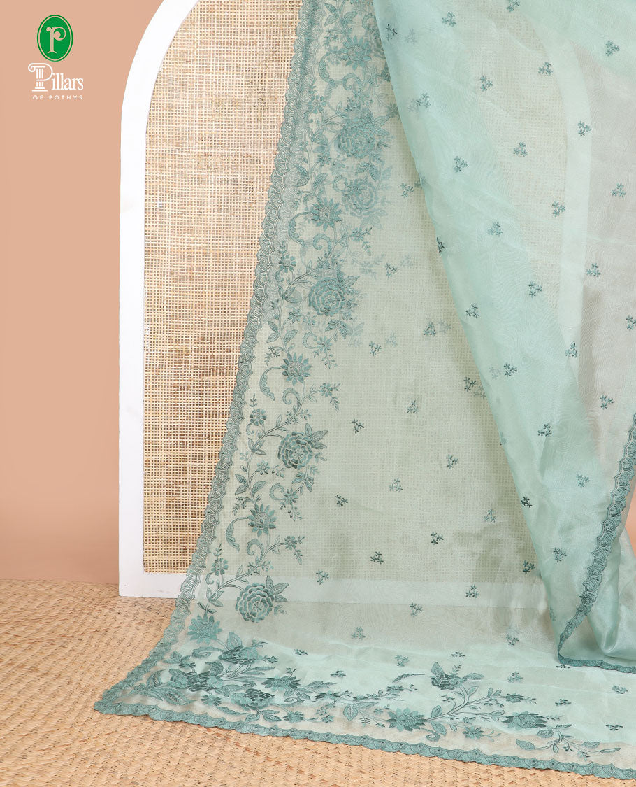 Pista green embroidered tissue organza saree with floral embroidery, scallop border & embroidery pallu along with embroidered blouse