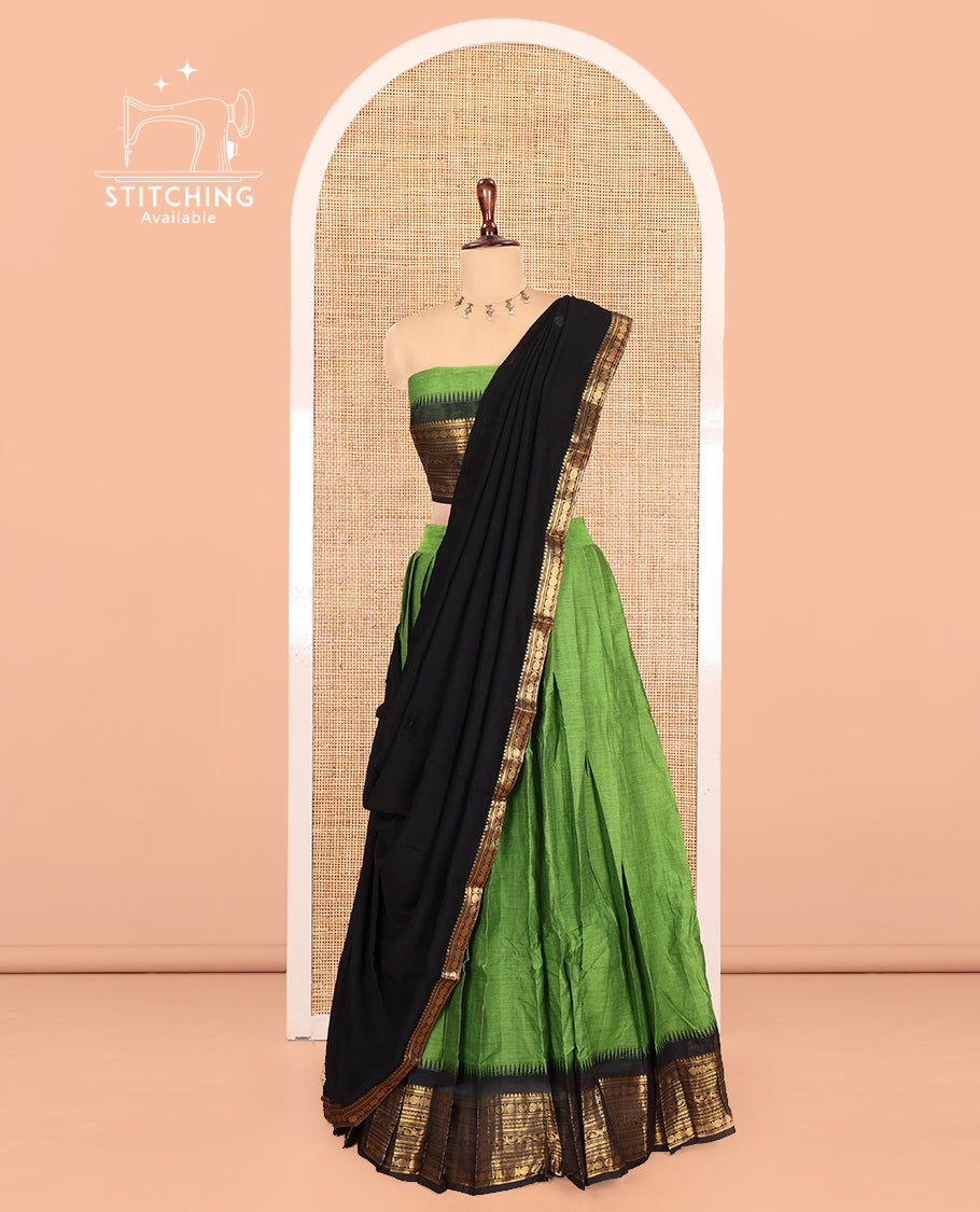 Leaf Green-Black Chettinad Cotton Half-Saree, Plain Contrast Traditional Zari-Bordered Skirt, Matching Blouse, and a Contrast Dhavani