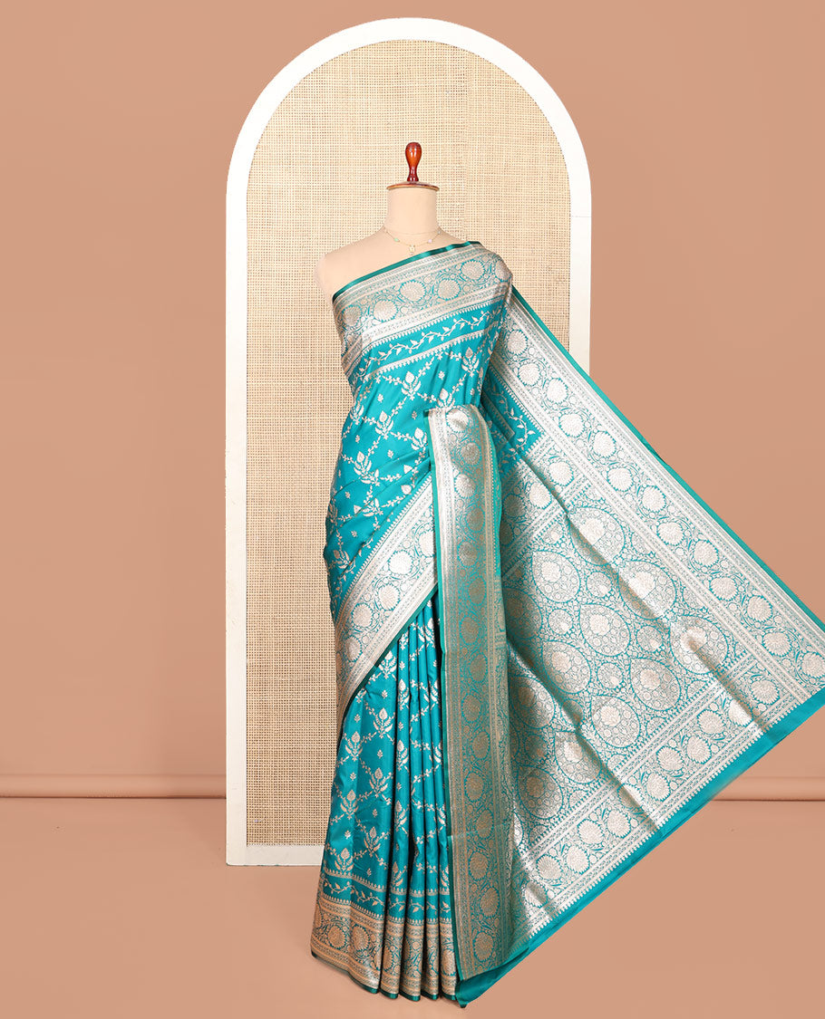Blue Semi-Banaras Saree, Richly Detailed with Jaal Jacquard on Its Body, Highlighted by Floral Creeper Design Border, Intricately Designed Pallu, and Paired with a Contrast Blouse