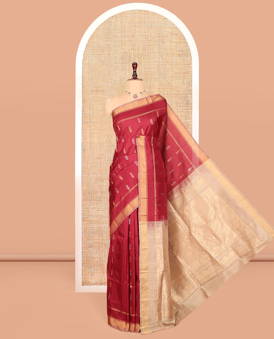 Red Uppada Silk Saree, Adorned with Buttas, a Contrast Zari Border, an Intricately Designed Pallu, and a Contrast Blouse