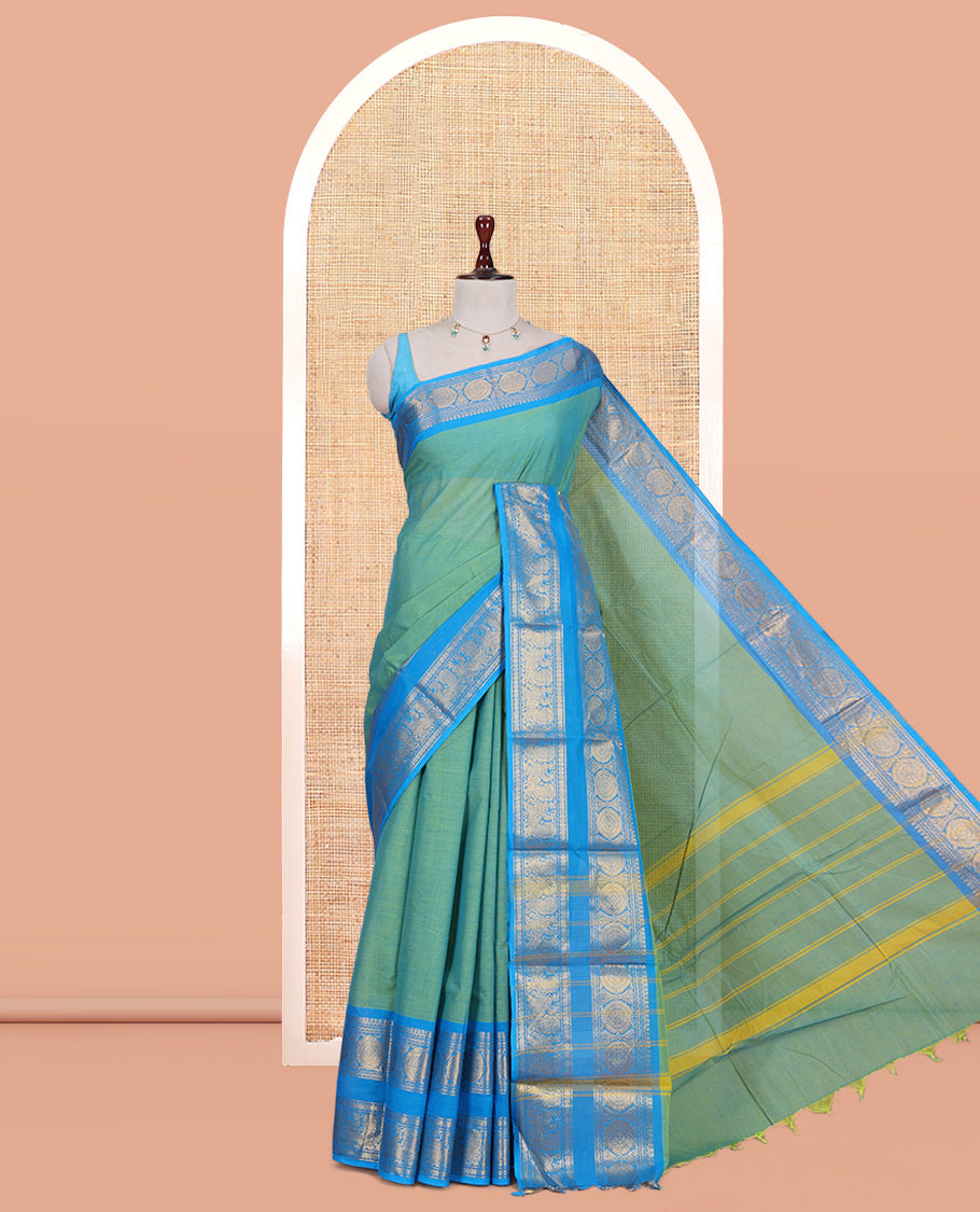 Sea Green Plain Chettinad Cotton Saree, Complemented by a Contrast Traditional Zari Rettai Pettu Border, and a Matching Blouse