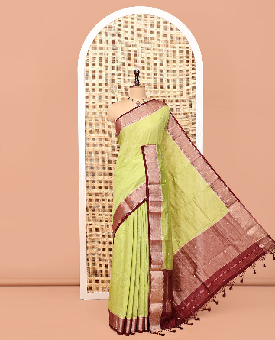 Green Assam Silk Saree, Adorned with Butta Enclosed Checks, Complemented by Contrast Traditional Zari Border, Gleaming Pallu, and Contrast Blouse