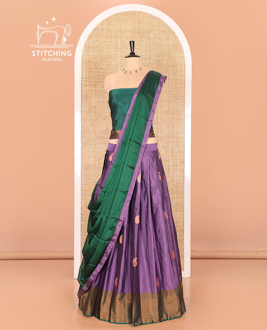 Lavender and green half-saree with paisley buttas with contrast traditional bordered taffeta silk skirt, a matching blouse, and a contrast bordered syska georgette dhavani