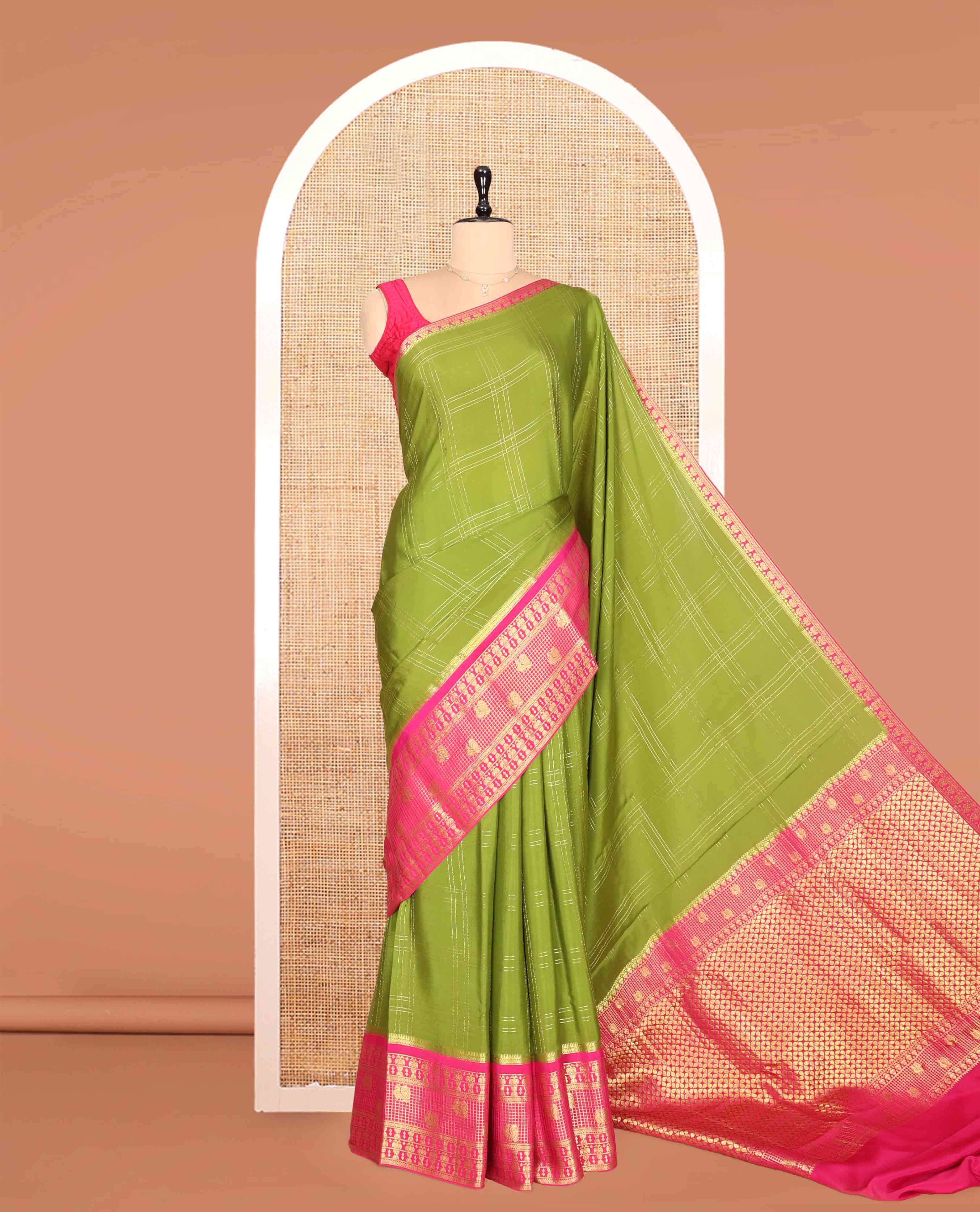 Green Mysore Silk Saree, Gracefully Embellished with Zari Checks, a Contrast Iruthalai Pakshi-Peacock Zari Border, Grand Pallu, and a Contrast Blouse