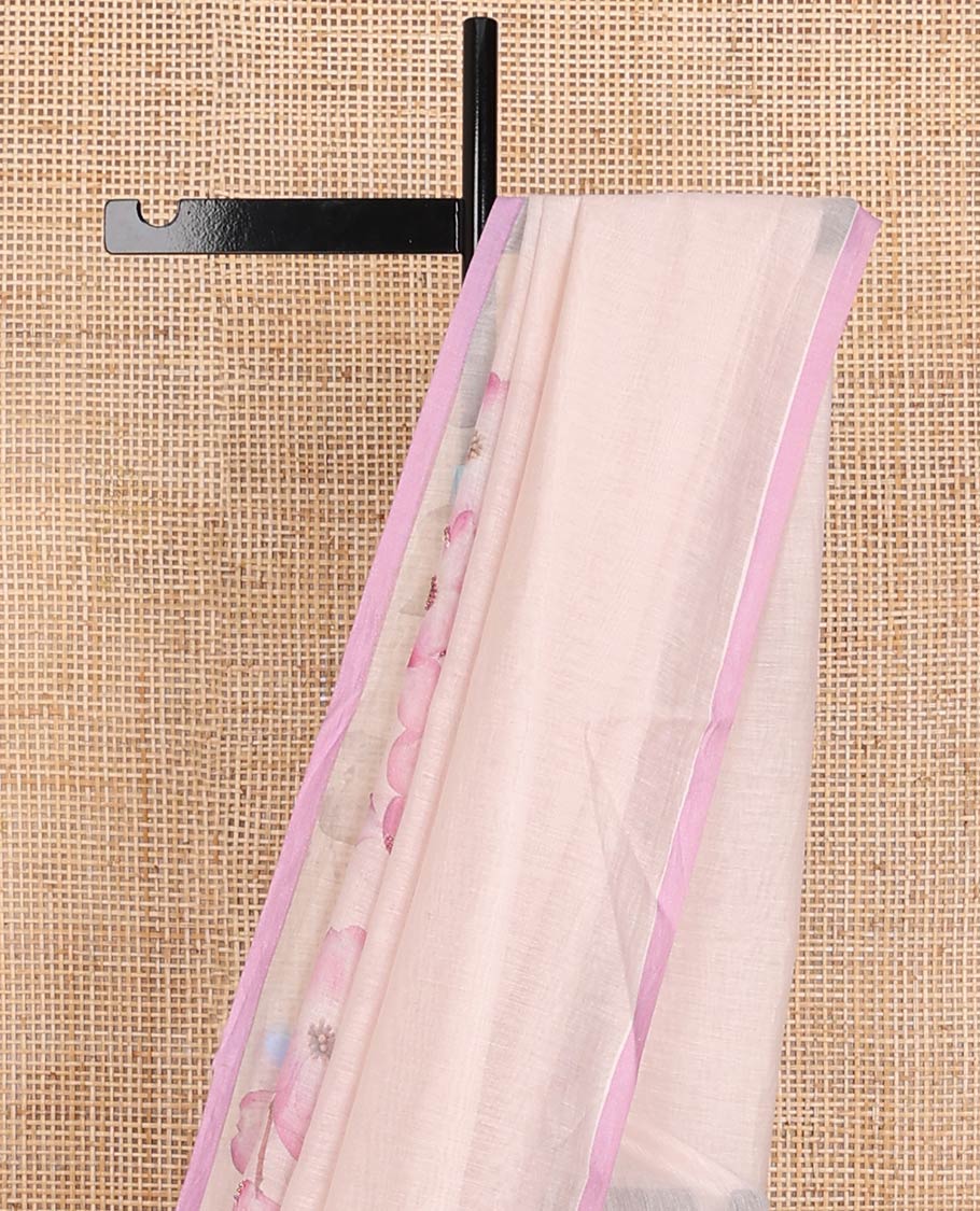 Pastel pink printed Chanderi cotton saree features floral motifs all over its border & pallu, contrast plain border