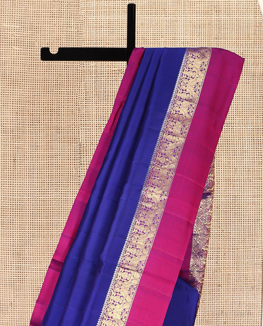 Blue Plain Kanchipuram Silk Saree, Complemented by a Contrast Border of Muthu, Mayil, and Vanki Designs, Jaal Pallu, and Paired with a Contrast Blouse
