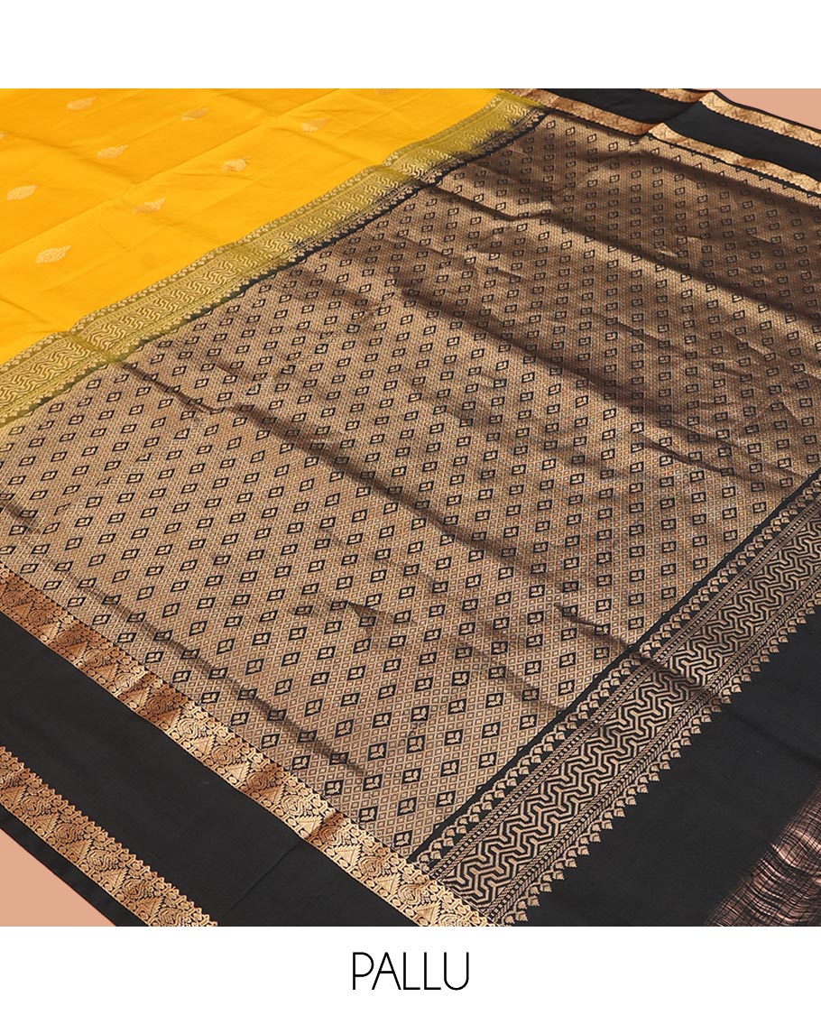 Yellow Mayuri Soft Silk Saree, Subtly Sparkled with Zari Buttas All Over Its Body, Complemented by a Contrast Border of Rekku, Paisa, Manga, and Thazampoo Rekku Designs, Intricately Designed Pallu, and Paired with a Contrast Blouse