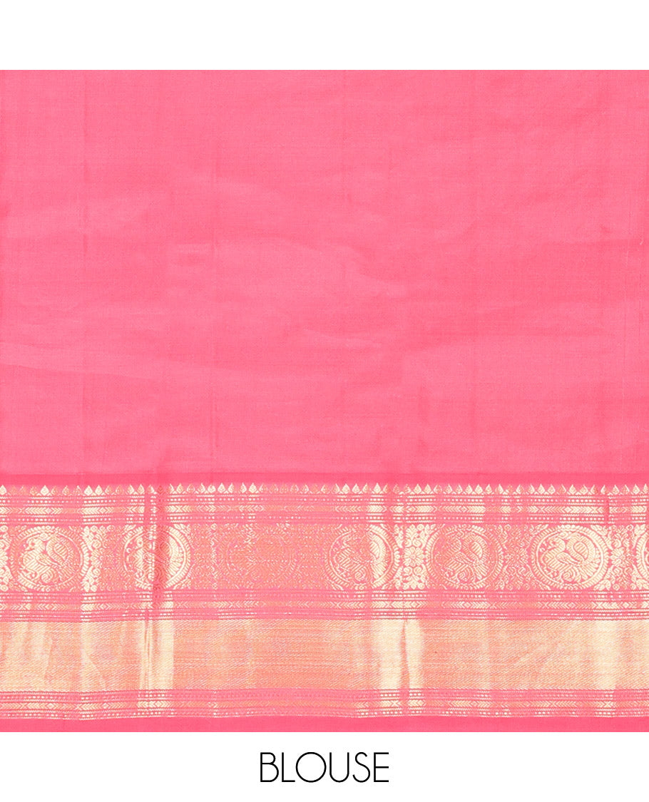 Mango Yellow Vasundhara Silk Saree, Subtly Sparkled with Sparse Stripes and Zari Buttas, Complemented by a Contrast Border of Thilakam, Banaras, Muthu, and Round Mayil Designs, Pallu Steeped with Traditional Designs, and Paired with a Contrast Blouse