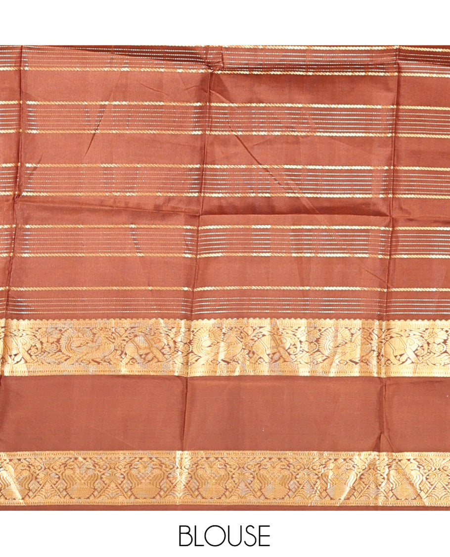 Pale Green Vasundhara Silk Saree, Enriched with Zari Buttas Enclosed Checks All Over Its Body, Complemented by a Contrast Rettai Pettu Border of Muthu, Banaras, and Iruthalai Pakshi Designs, a Grand Pallu, and Paired with a Contrast Blouse