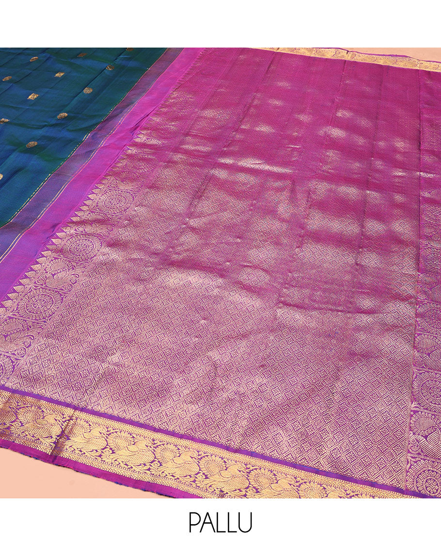 Blue Kanchipuram Silk Saree, Artfully Woven with Mayil Chakram Buttas All Over Its Body, Complemented by a Contrast Border of Muthu, Kathir, and Mayil Designs, Grand Jaal Pallu, and Paired with a Contrast Blouse