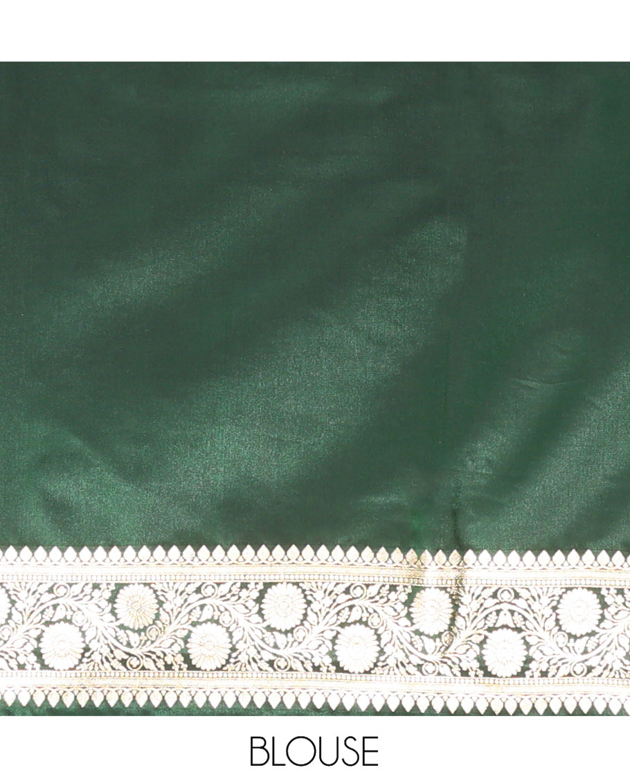 Green Banarasi Nylon Saree, Richly Detailed with Zari Buttas, Highlighted by a Traditional Zari Border, Intricate Pallu, and a Matching Blouse