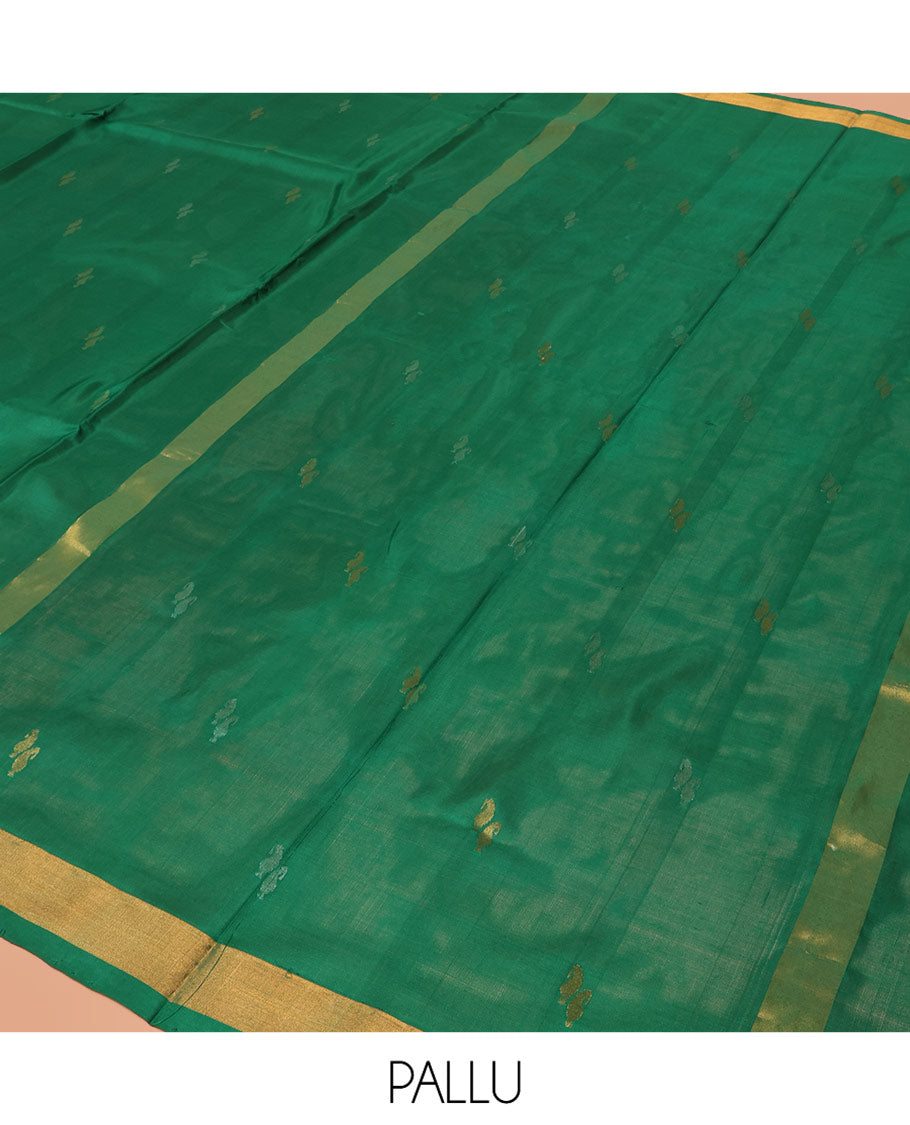 Green Uppada Silk Saree Entralled with Paisley Zari Buttas, Complemented by Bavanji Border, Pallu Depicting Zari Buttas, and Paired with a Matching Blouse