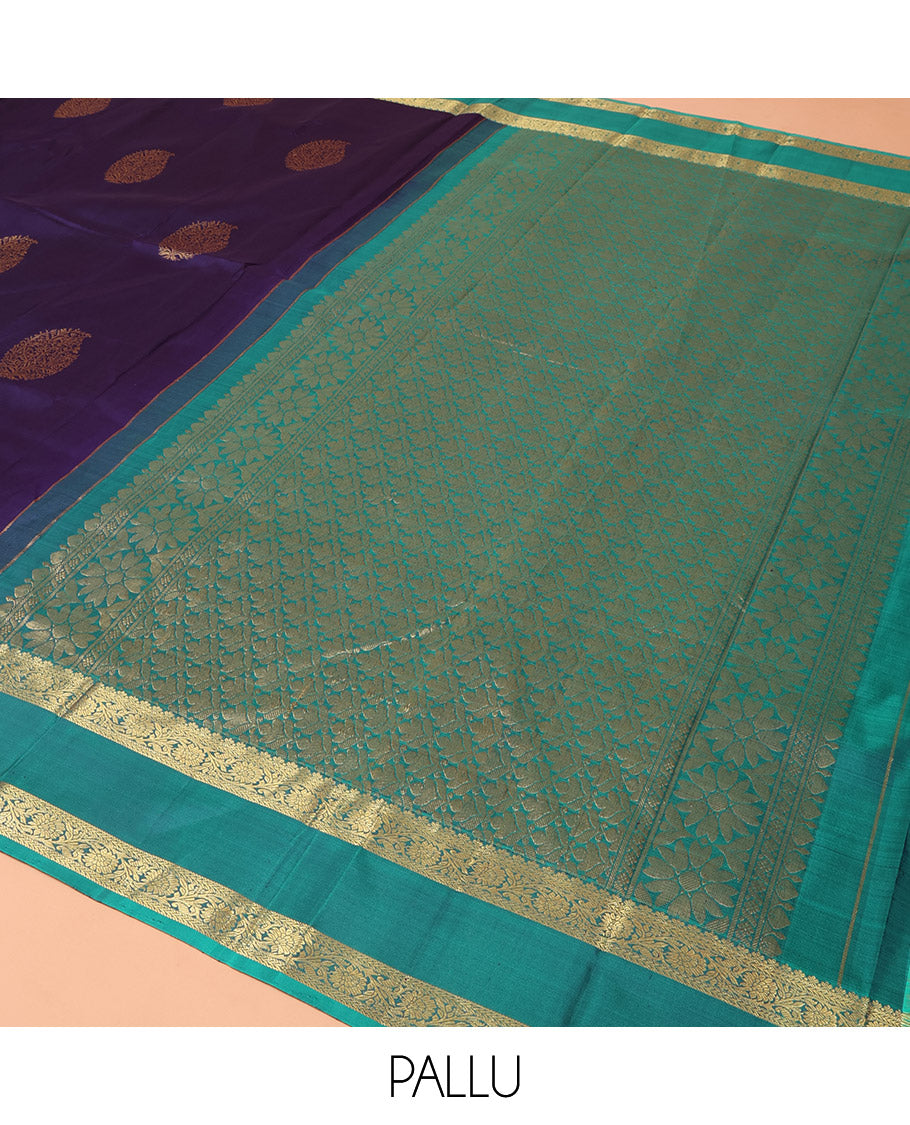 Blue Kanchipuram Silk Saree Elegantly Woven with Zari Buttas, Complemented by a Contrast Rettai Pettu Border Depicting Kodi Visiry Designs, Pallu Adorned with Intricate Designs, and Paired with a Contrast Blouse