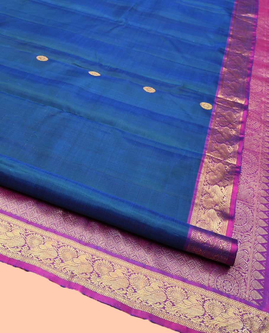 Blue Kanchipuram Silk Saree, Artfully Woven with Mayil Chakram Buttas All Over Its Body, Complemented by a Contrast Border of Muthu, Kathir, and Mayil Designs, Grand Jaal Pallu, and Paired with a Contrast Blouse