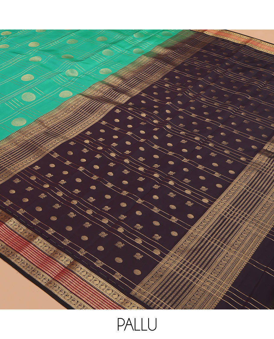 Green Vasundhara Lite Silk Mix Saree Features Butta Enclosed Checks, a Contrast Manga Design Border, Mayil-Chakram Pallu, and Contrast Blouse