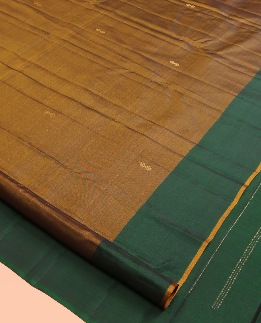 Brown Kanchipuram Silk Saree, Subtly Woven with Buttas, Complemented by a Contrast Thazampoo Rekku Border, Grand Floral Pallu, and Contrast Blouse