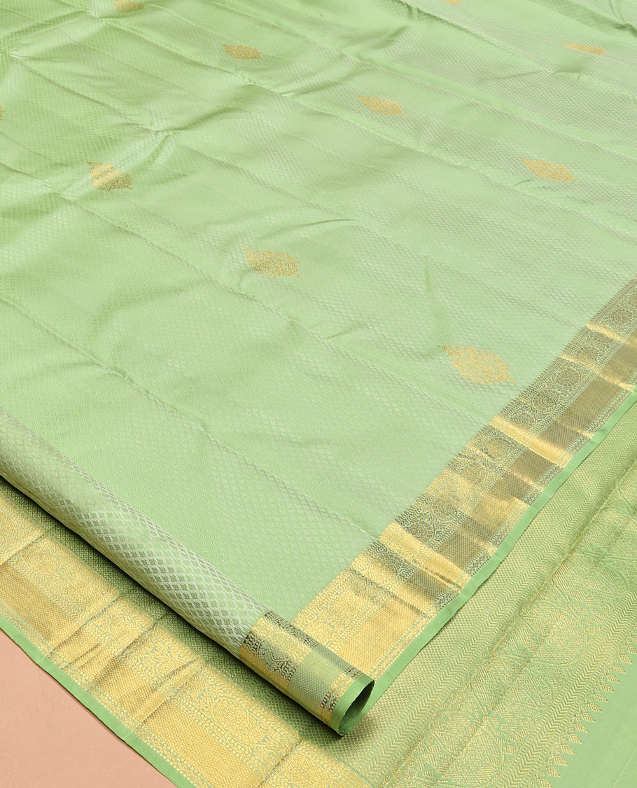 Green Embossed Parambara Silk Saree, Adorned with Zari Border of Rekku, Muthu, Kathir, Kuyil Kann, and Kodi Visiry Designs, Pallu of Mayil Kann, and Matching Blouse