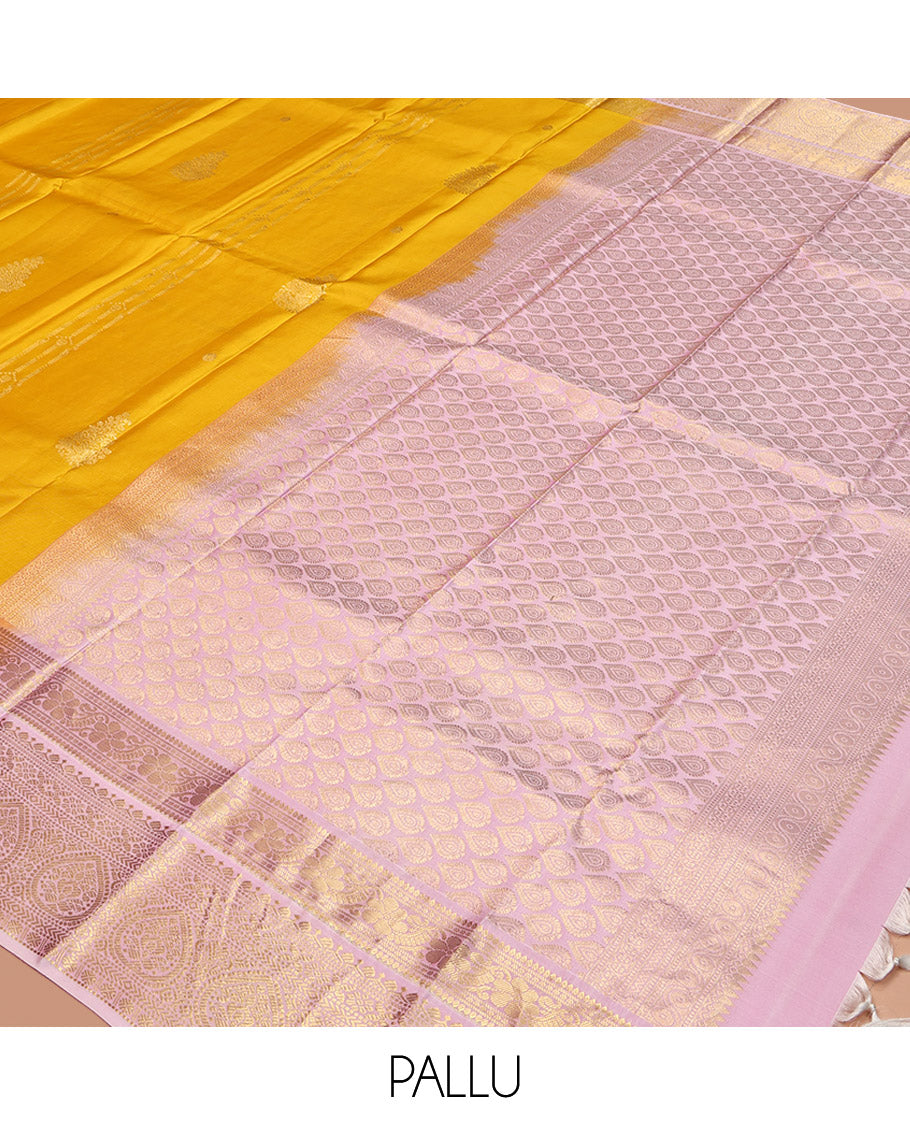 Mustard Yellow-Beach Pink Vasundhara Silk Saree, Richly Detailed with Zari Buttas, Complemented by Contrast Border of Kamalam, Muthu, Cross Kamalam, Rudraksham, and Thilakam Design, Pallu Steeped with Thilakam Designs, and Paired with a Contrast Blouse