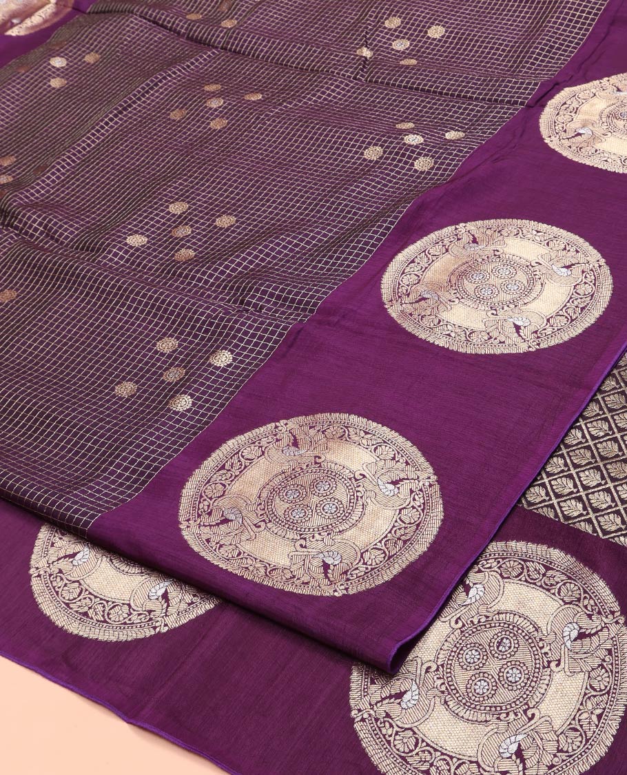 Dark Purple H O-Silk Saree, Beautifully Decked up with Zari Buttas and Zari Checks On Its Body, Accentuated with Contrast Big Chakram Motifs Woven Border, Grand Jaal Design Woven Pallu, and Paired with a Checked Blouse