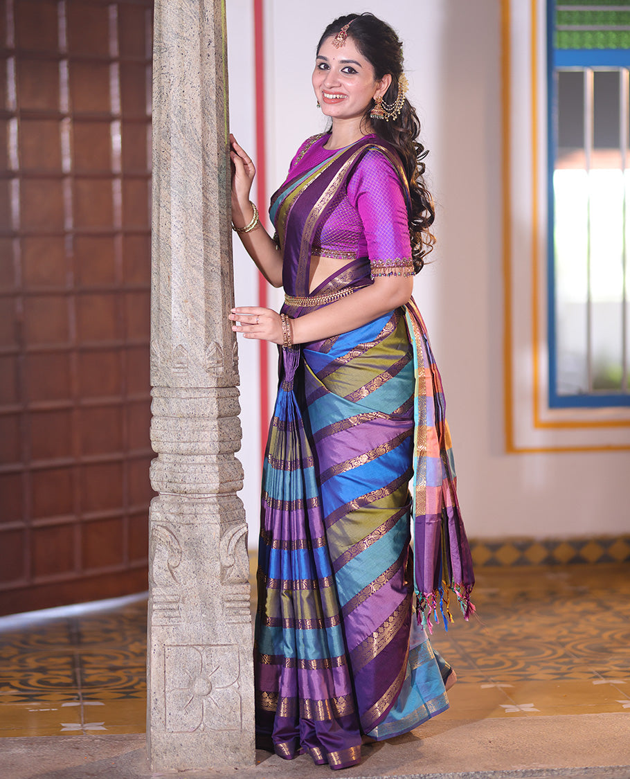 Multi Color Semi-Soft Silk Saree, Richly Detailed with Multi-color Stripes and Traditional Zari Designs On Its Body, Complemented by Contrast Rettai Pettu Traditional Zari Designs Woven Border, Grand Pallu and Paired with a Contrast Blouse