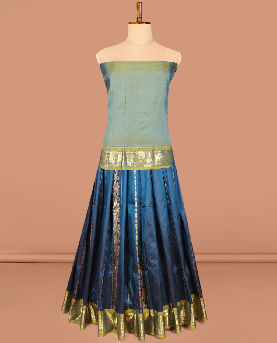 Blue Pure Silk Half-Saree, Adorned with Zari Designs on Its Body, Complemented by a Contrast Floral and Paisley Design Border, Complemented by a Contrast Blouse, and Paired with a Contrast Dhavani of Leaf-Paisley Designs